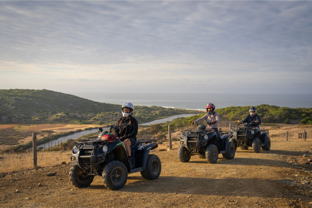 Three people enjoying time with Waitpinga Quad Bikes